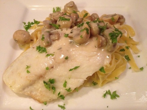 Doradefilet met champignons en witte wijn